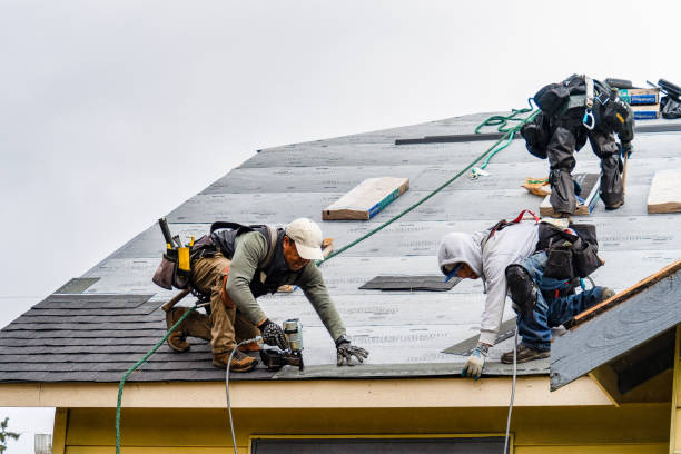 Professional Gutter Installation technician working in Sunnyside, WA